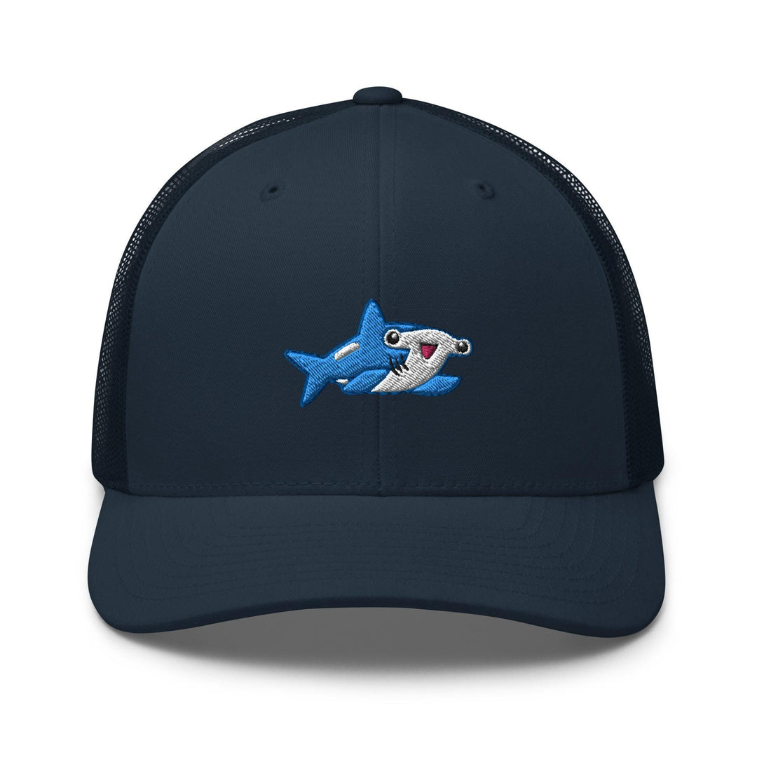 a blue hat with a shark on it