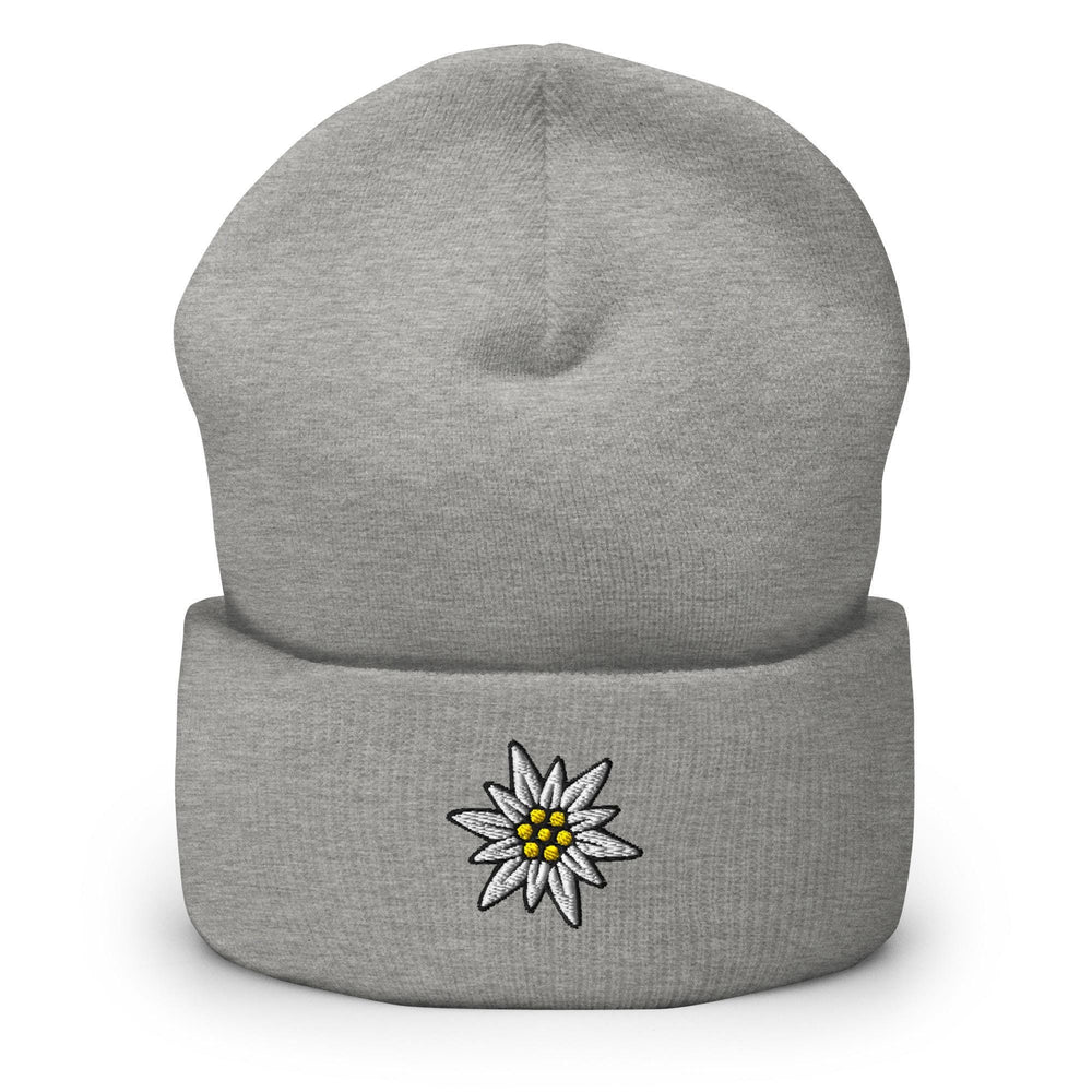 a grey beanie with a white flower on it