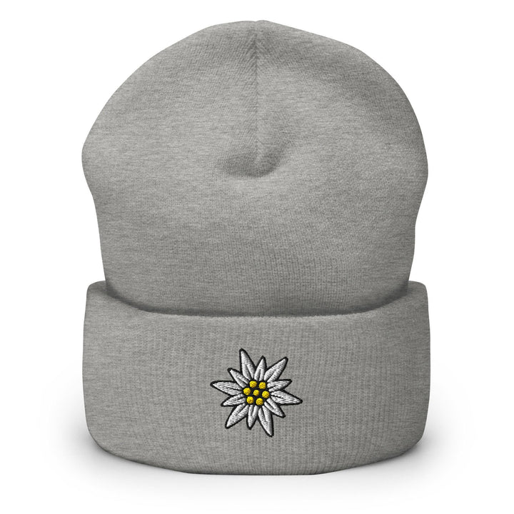 a grey beanie with a white flower on it