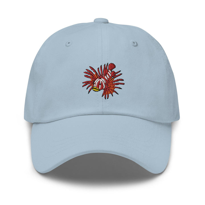 a light blue hat with a crab on it