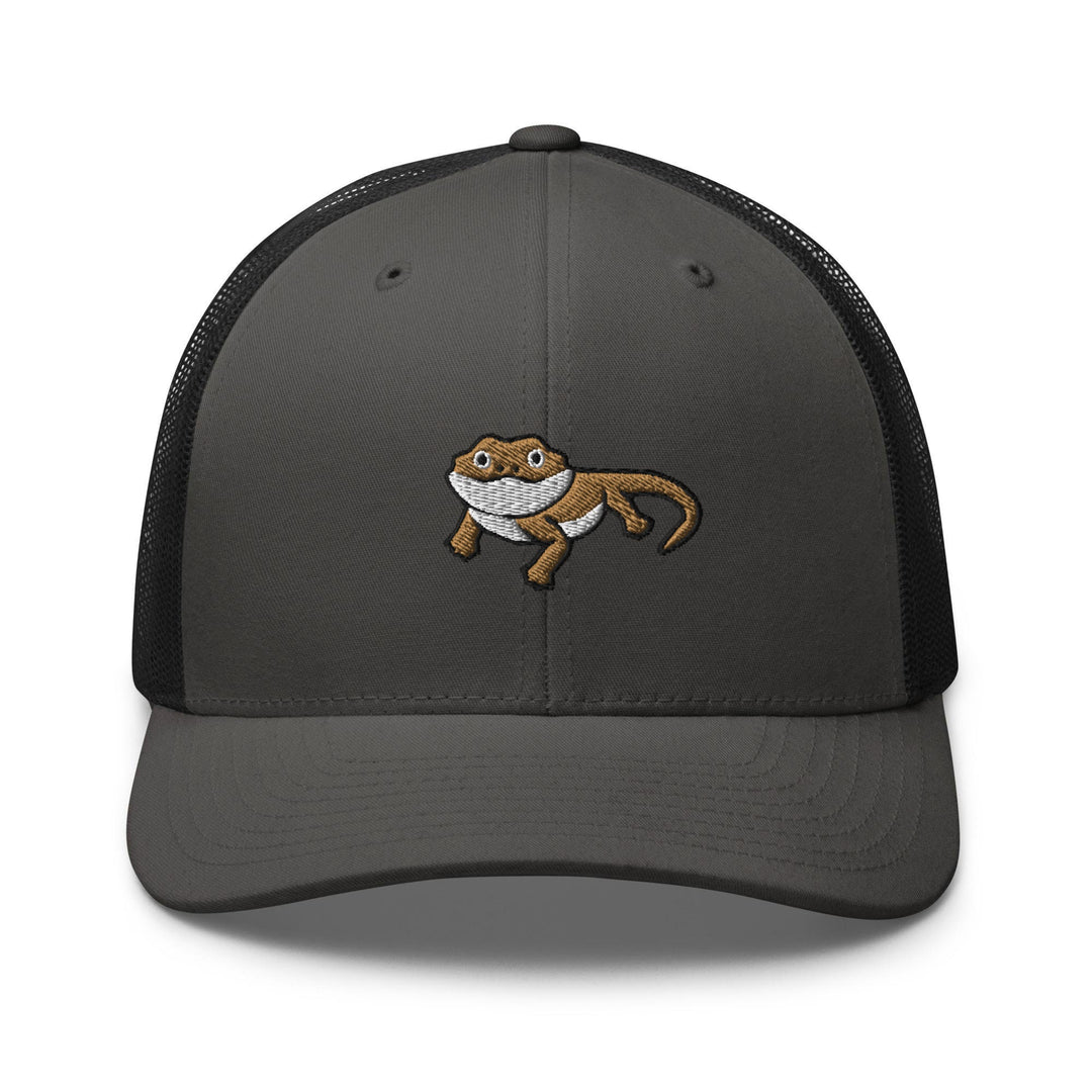 a gray and black trucker hat with a cartoon cat on it