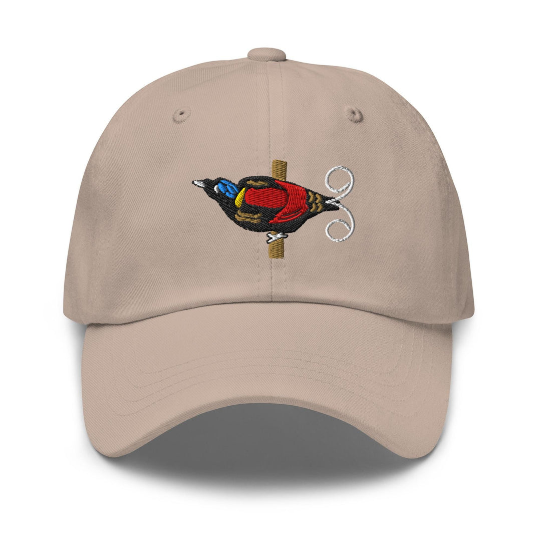 a baseball cap with a bird embroidered on it