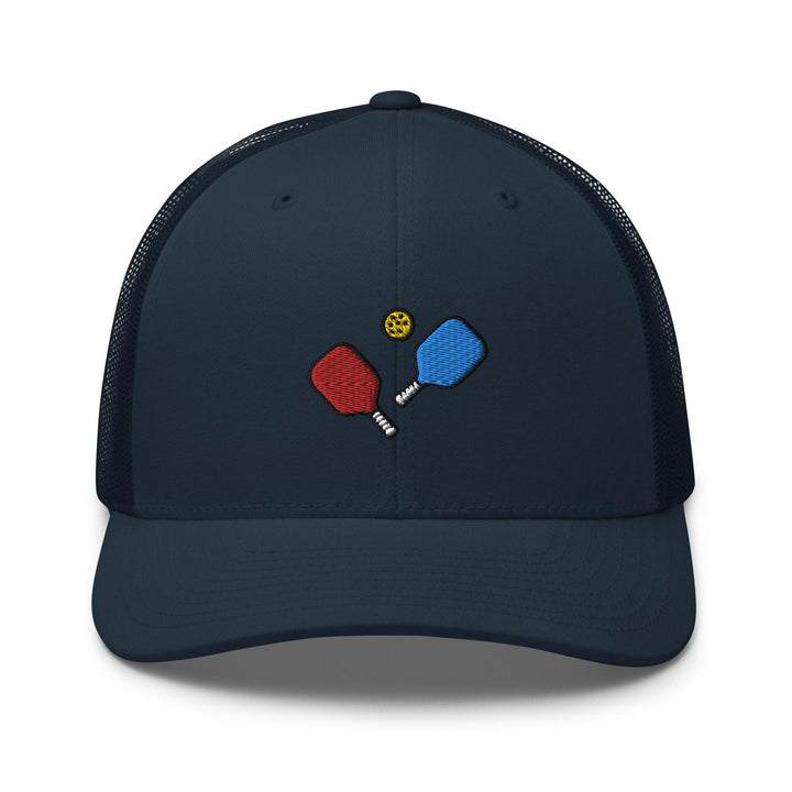 a blue hat with two ping pong paddles on it