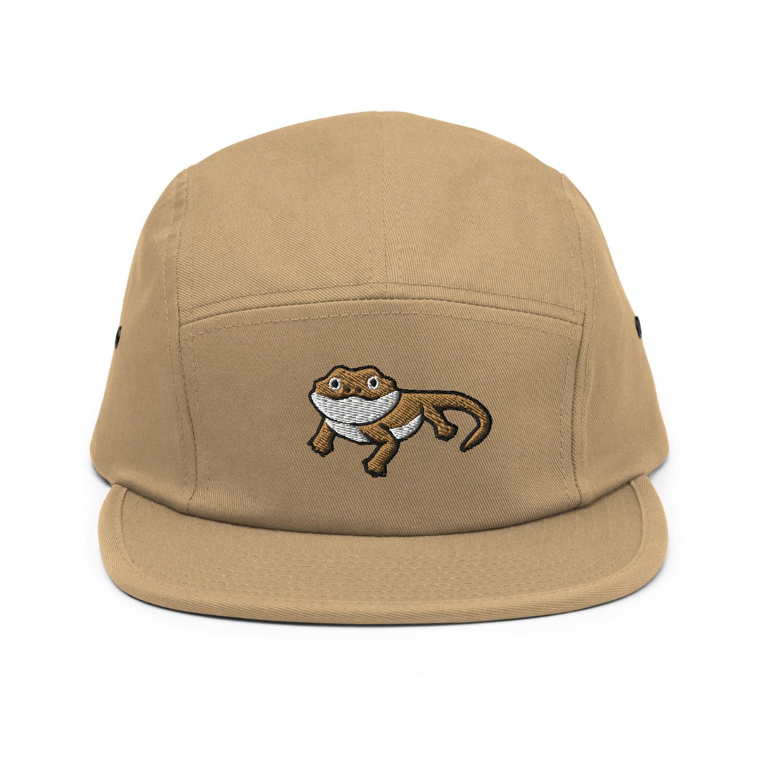 a brown hat with an image of a monkey on it