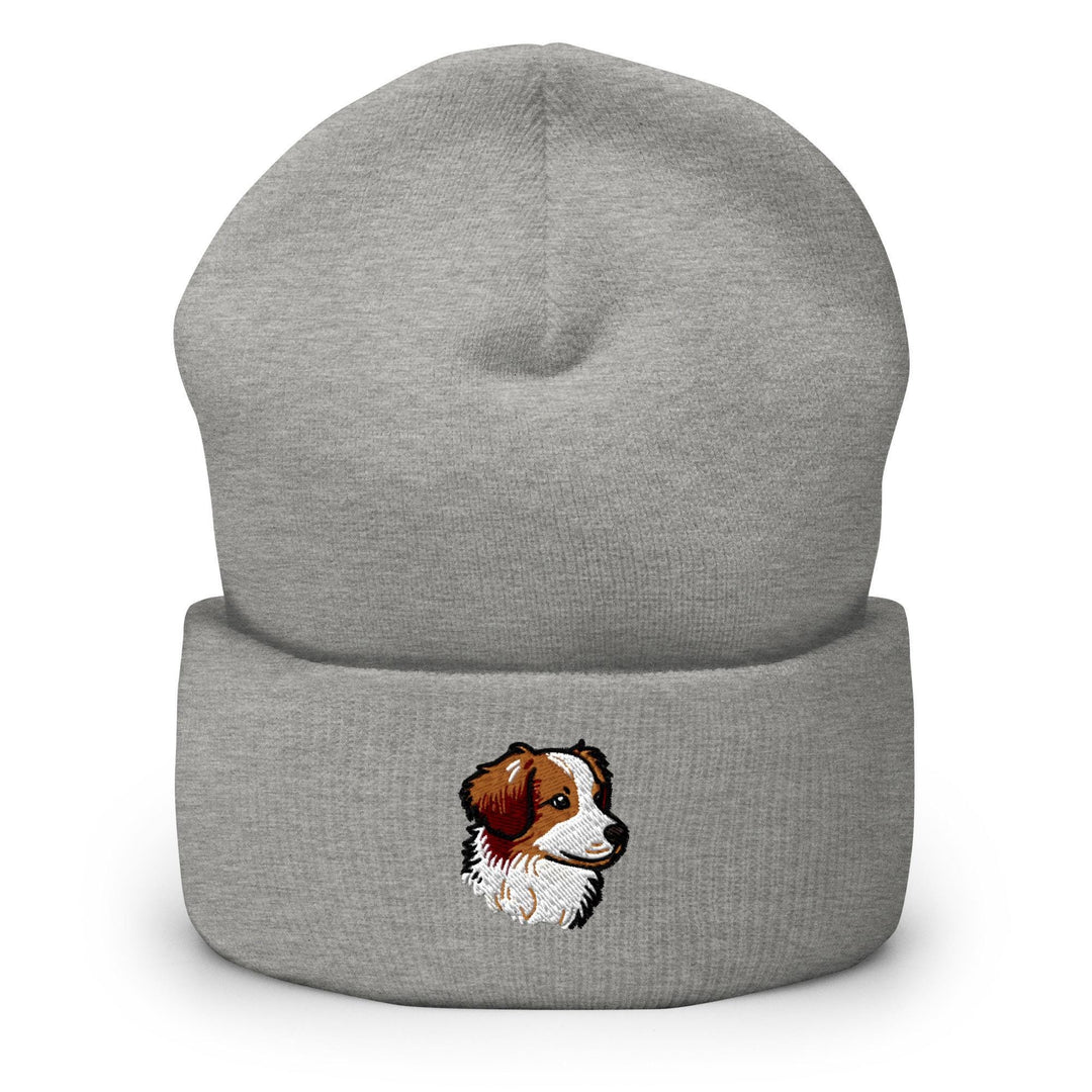 a grey beanie with a brown and white dog on it