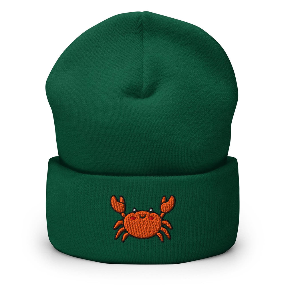 a green beanie with a crab embroidered on it