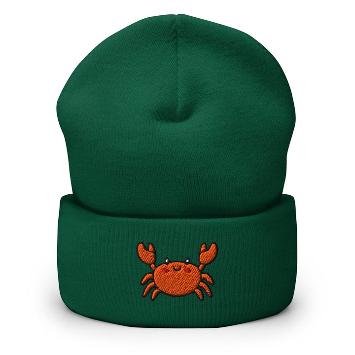a green beanie with a crab embroidered on it