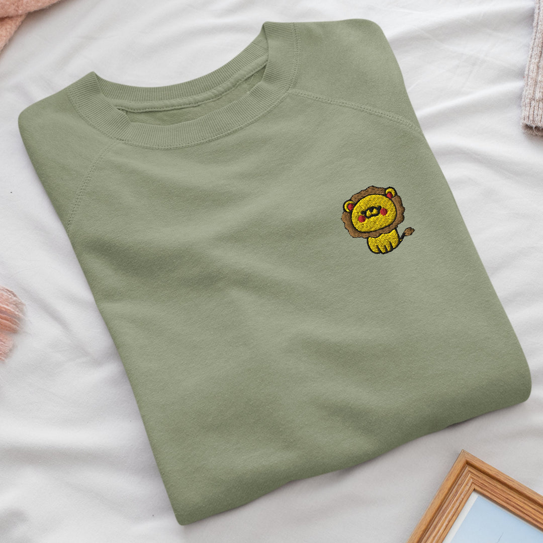 a t - shirt with a picture of a lion on it
