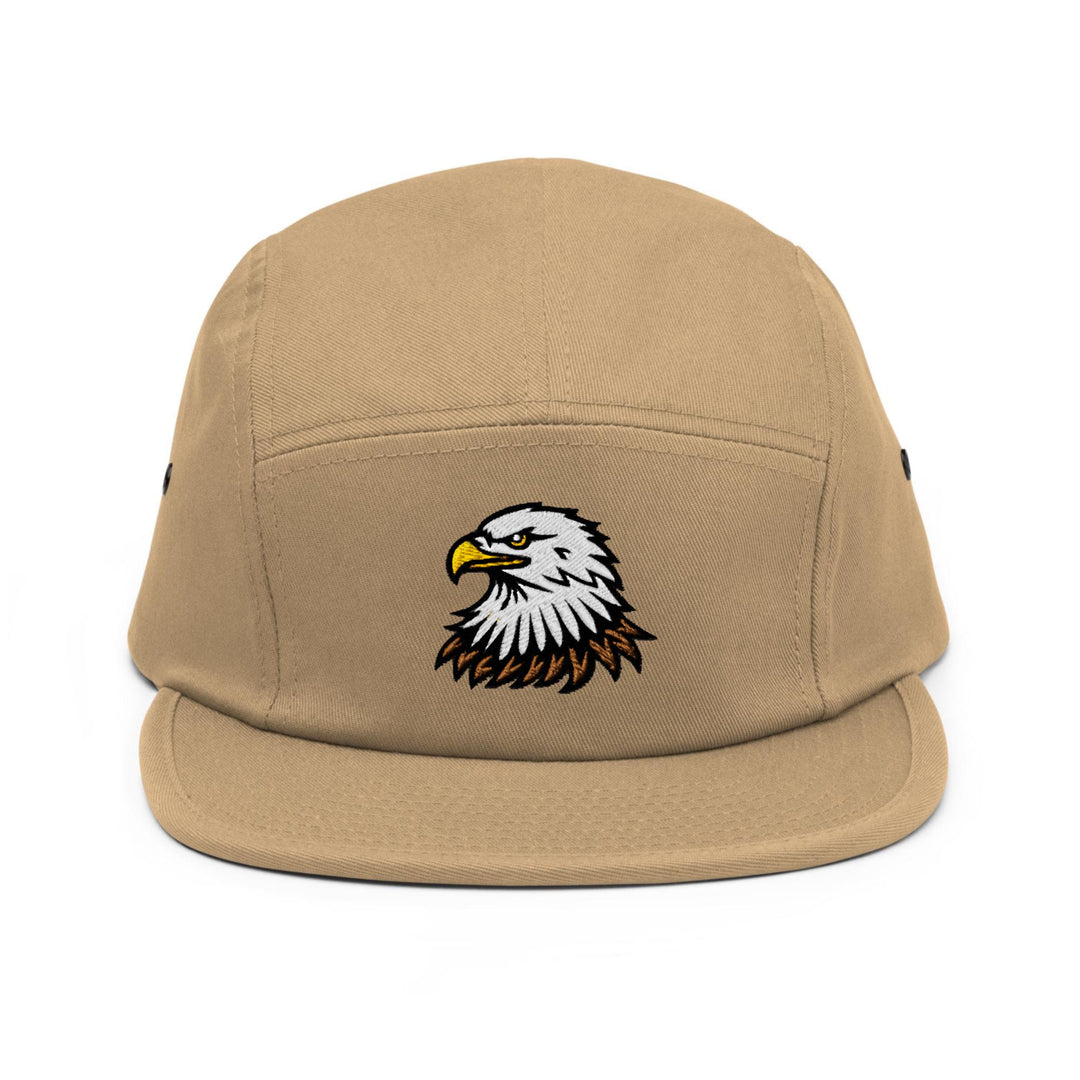 a tan hat with an eagle on it