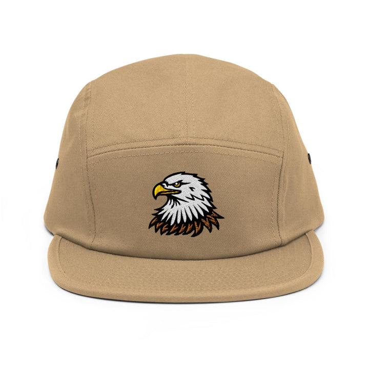 a tan hat with an eagle on it