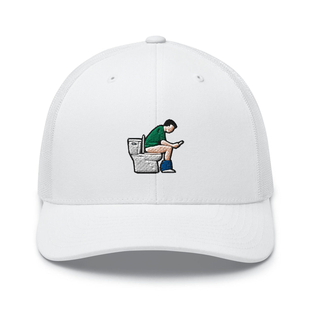 a white hat with a man sitting on a toilet