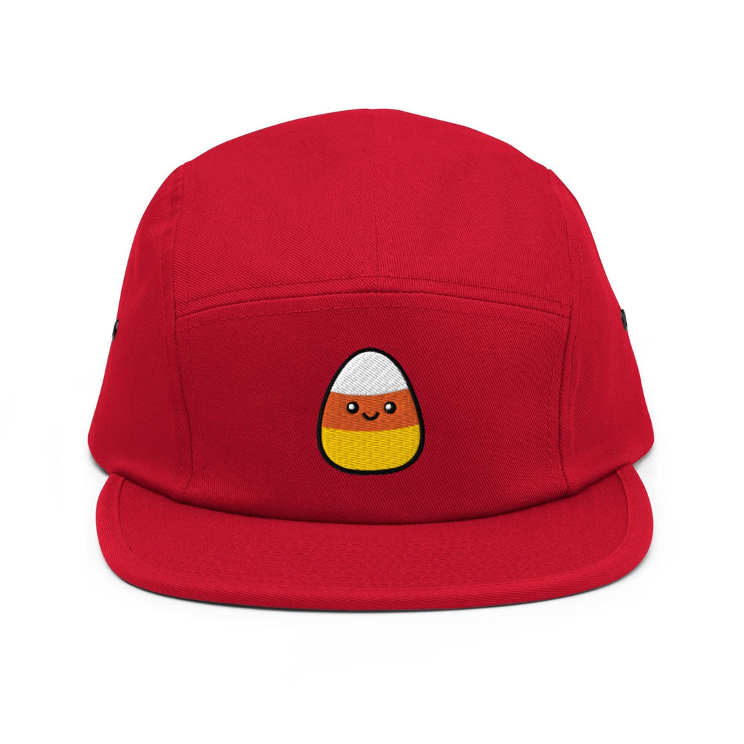 a red hat with a cartoon face on it