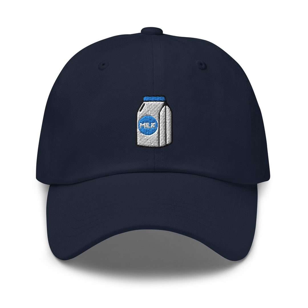 a blue cap with a bottle of milk embroidered on it
