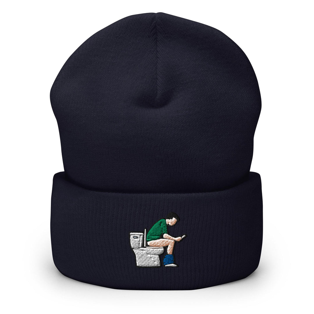a beanie with a picture of a man sitting on a toilet