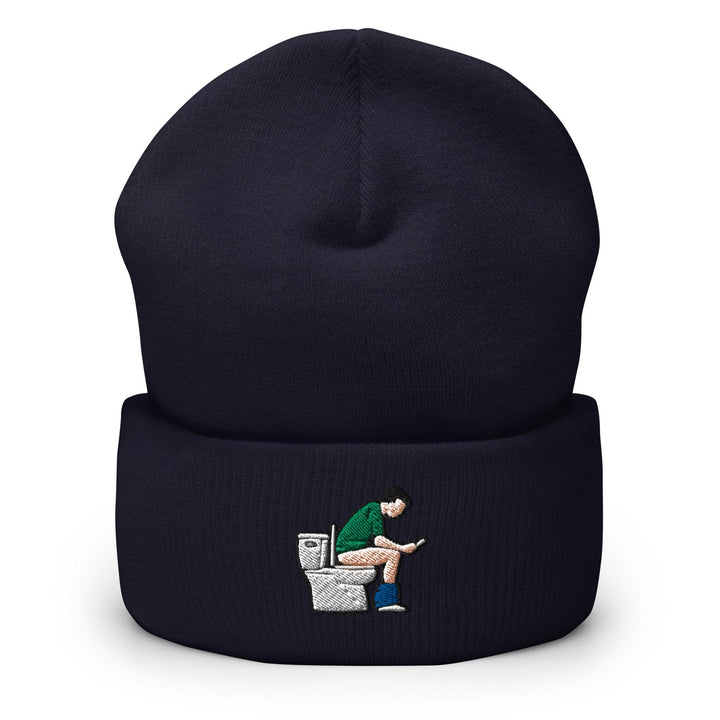 a beanie with a picture of a man sitting on a toilet