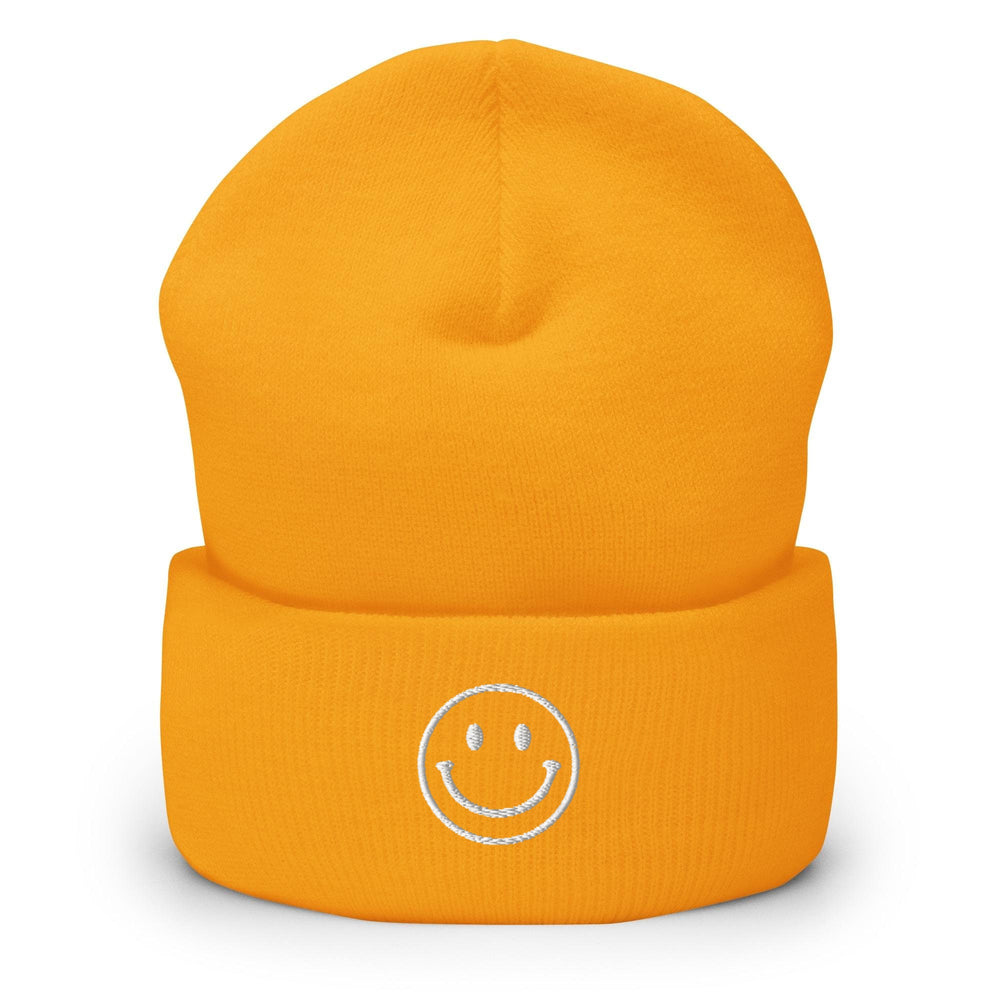 a yellow hat with a smiley face on it