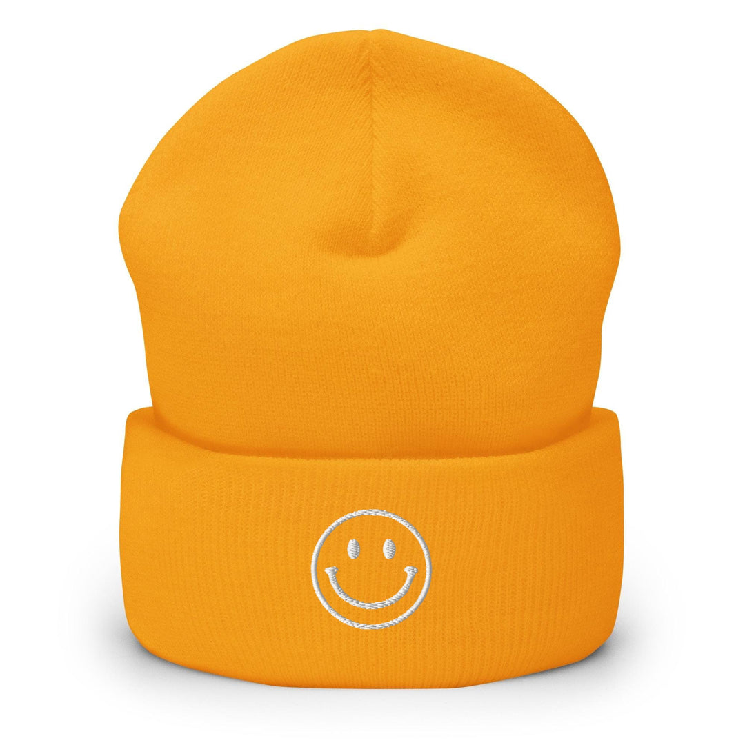 a yellow hat with a smiley face on it