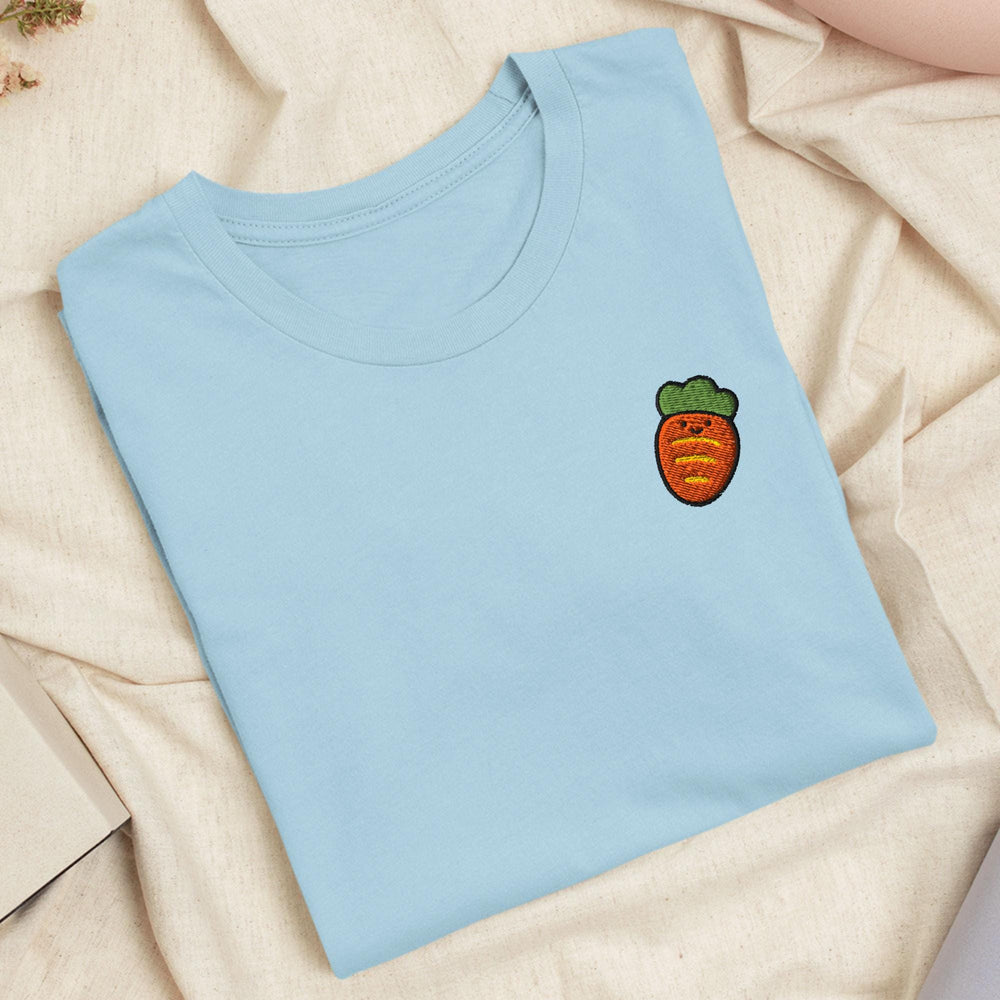 a blue t - shirt with a picture of a carrot on it