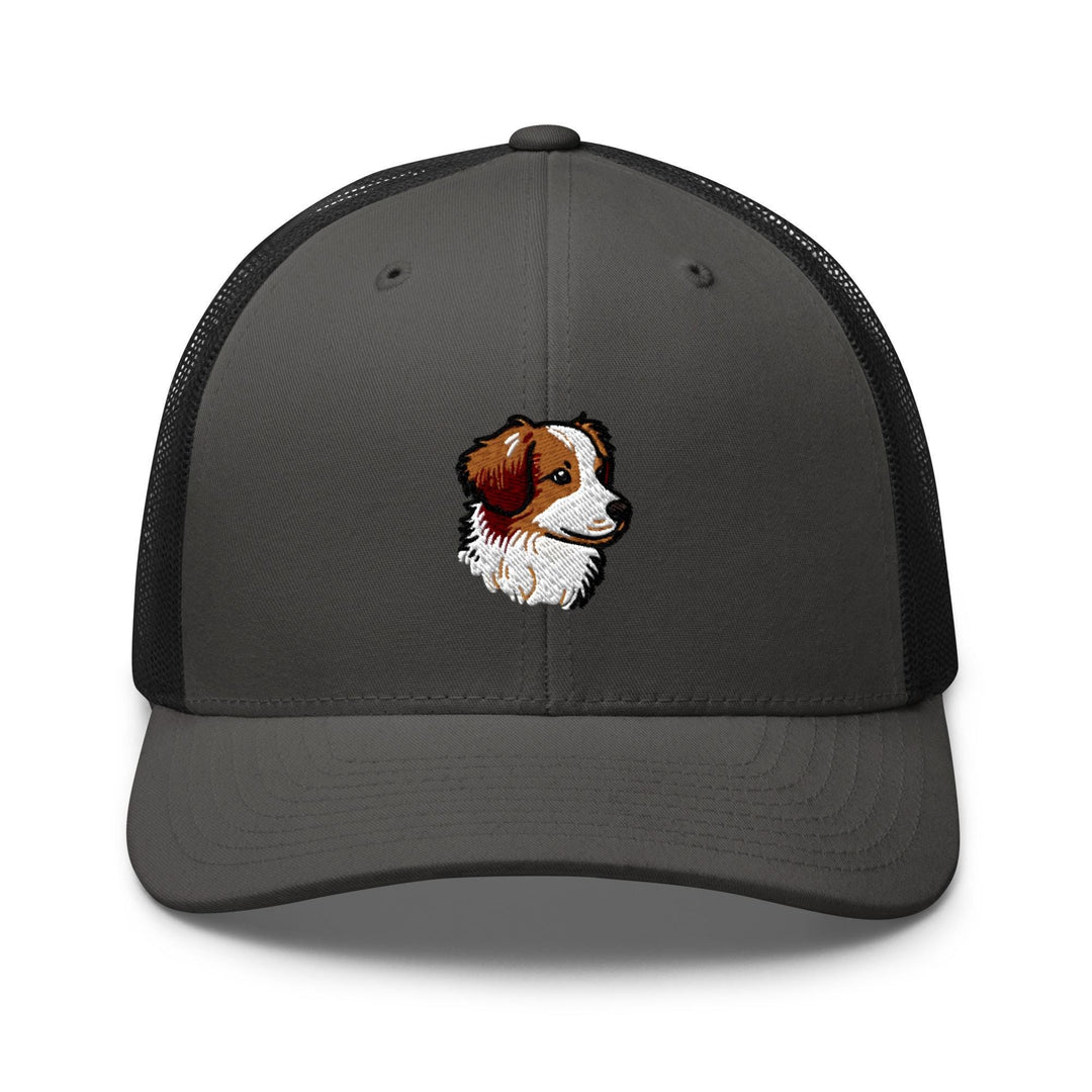 a gray and black trucker hat with a brown and white dog&#39;s face