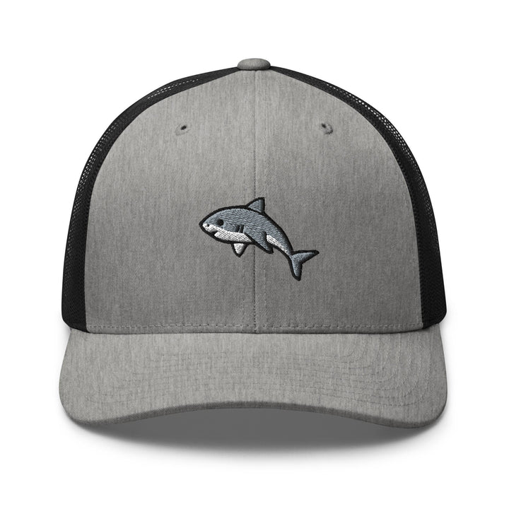 a gray and black hat with a shark embroidered on it
