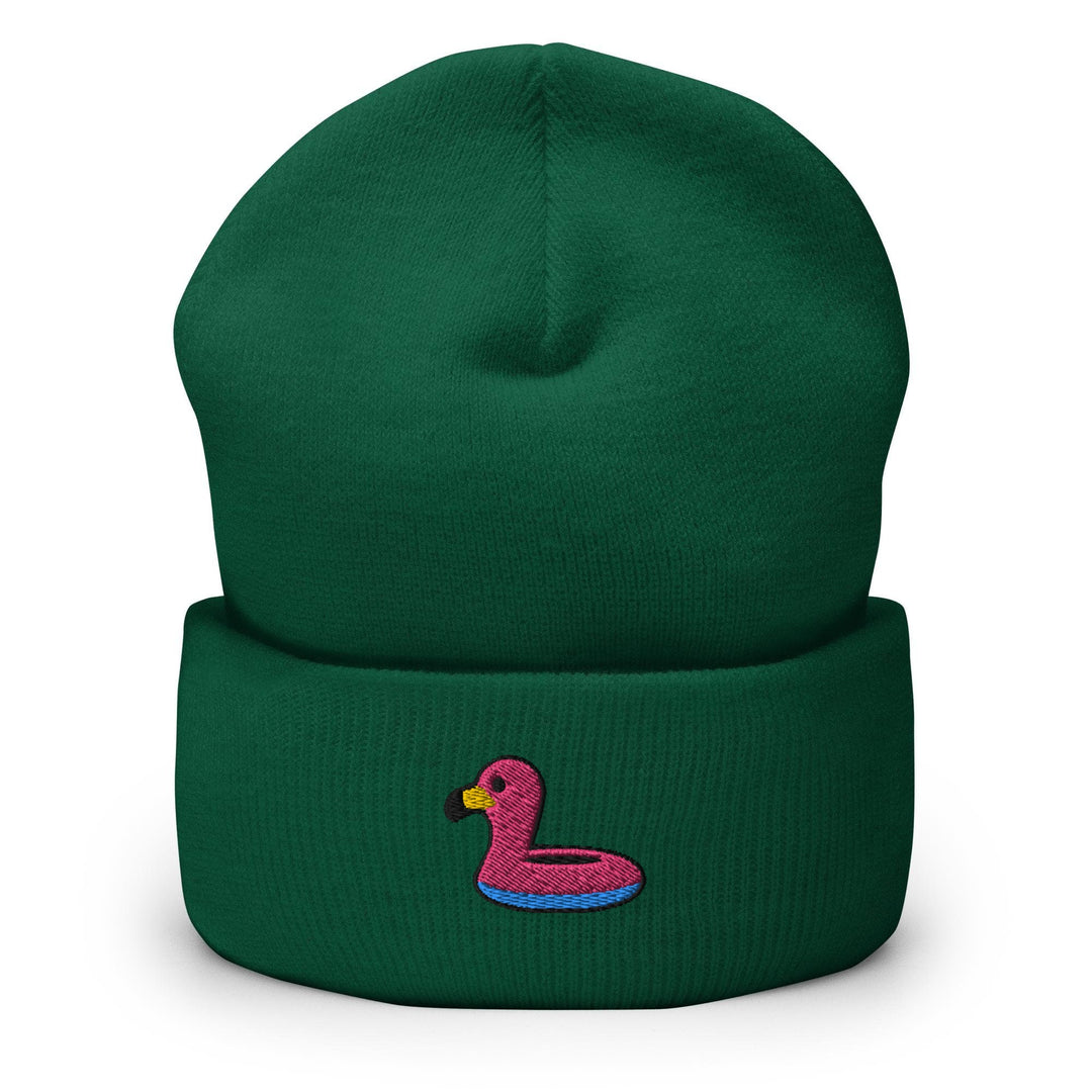 a green beanie with a pink flamingo on it