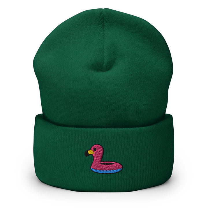 a green beanie with a pink flamingo on it