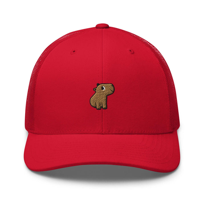 a red hat with a brown dog embroidered on it