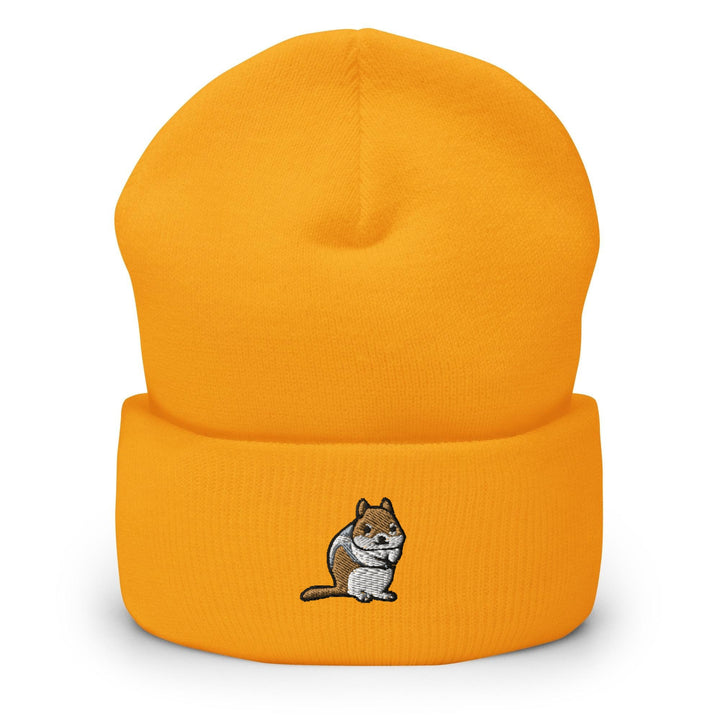 a yellow beanie with a cartoon cat on it