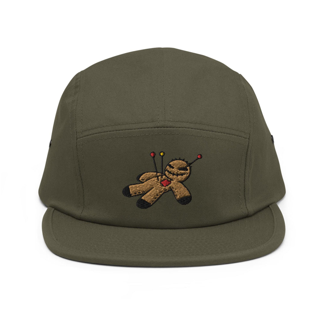 a green hat with a teddy bear embroidered on it