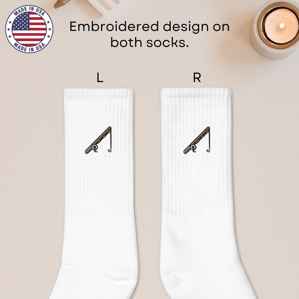 a pair of white socks with a design on them