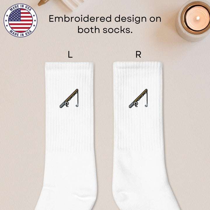 a pair of white socks with a design on them