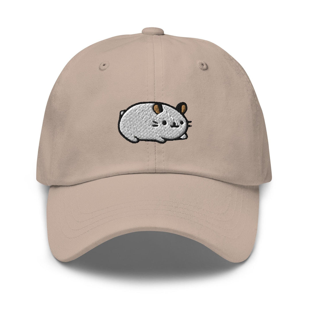 a tan hat with a white bear embroidered on it