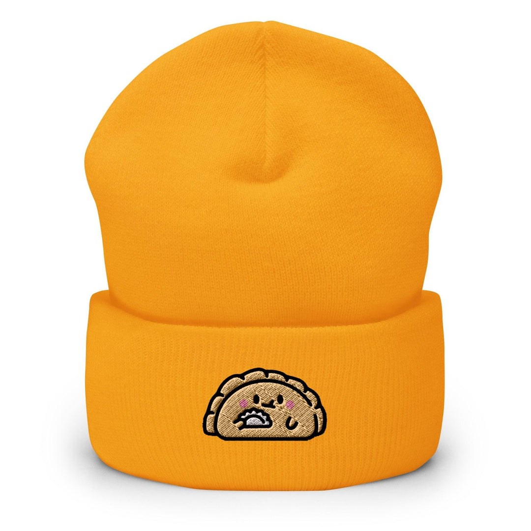 a yellow beanie with a picture of a turkey on it