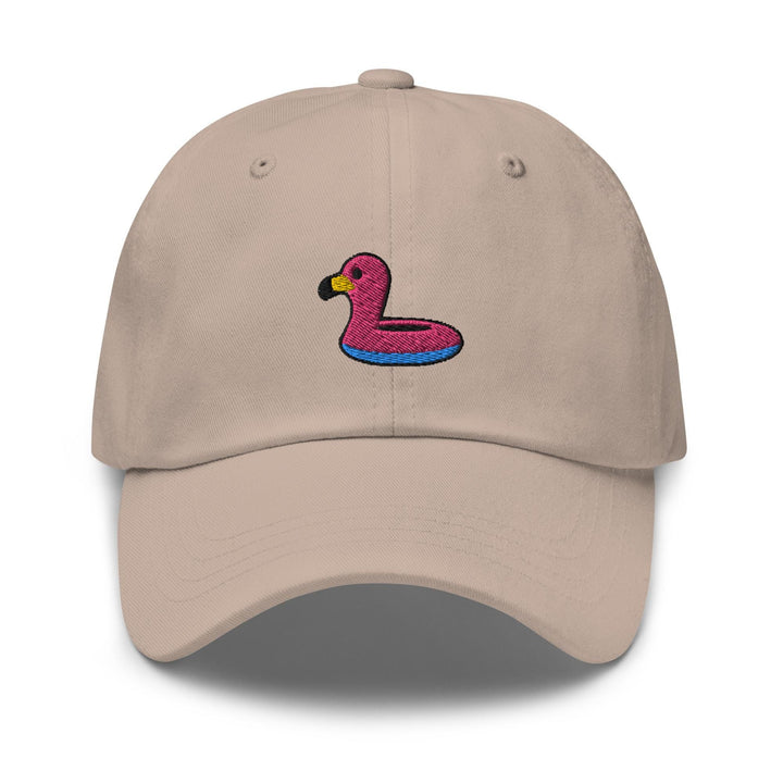 a tan hat with a pink flamingo embroidered on it