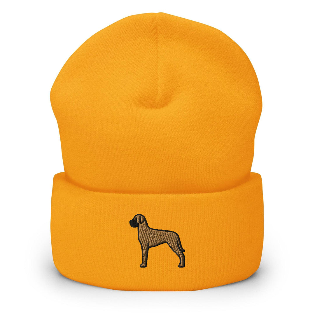 a yellow beanie with a black dog on it