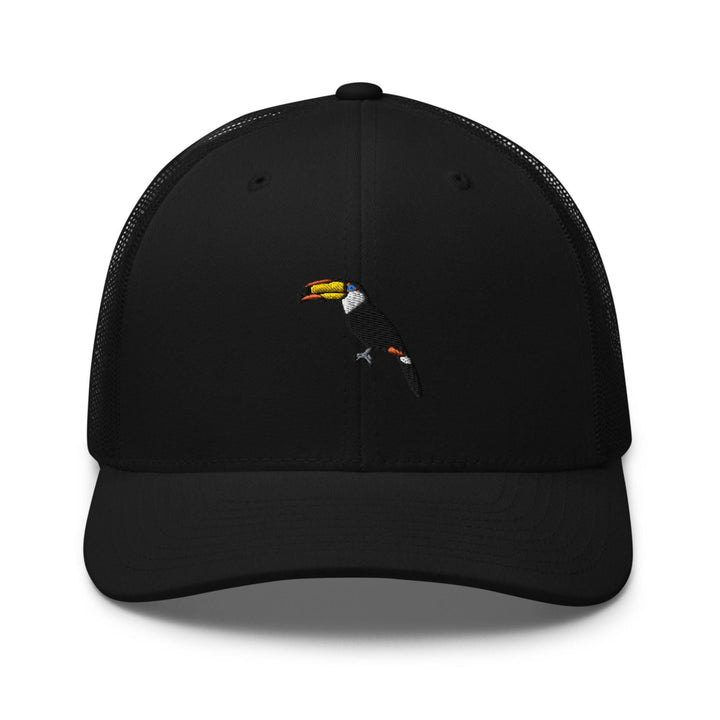 a black trucker hat with a toucan bird on it
