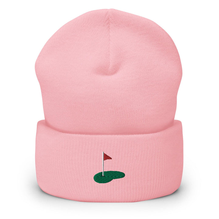 a pink hat with a red flag on it