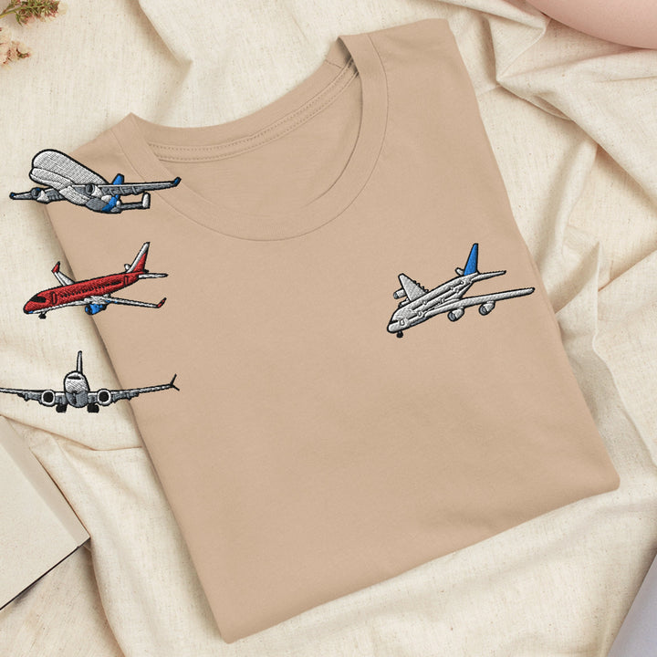 a t - shirt with a picture of airplanes on it