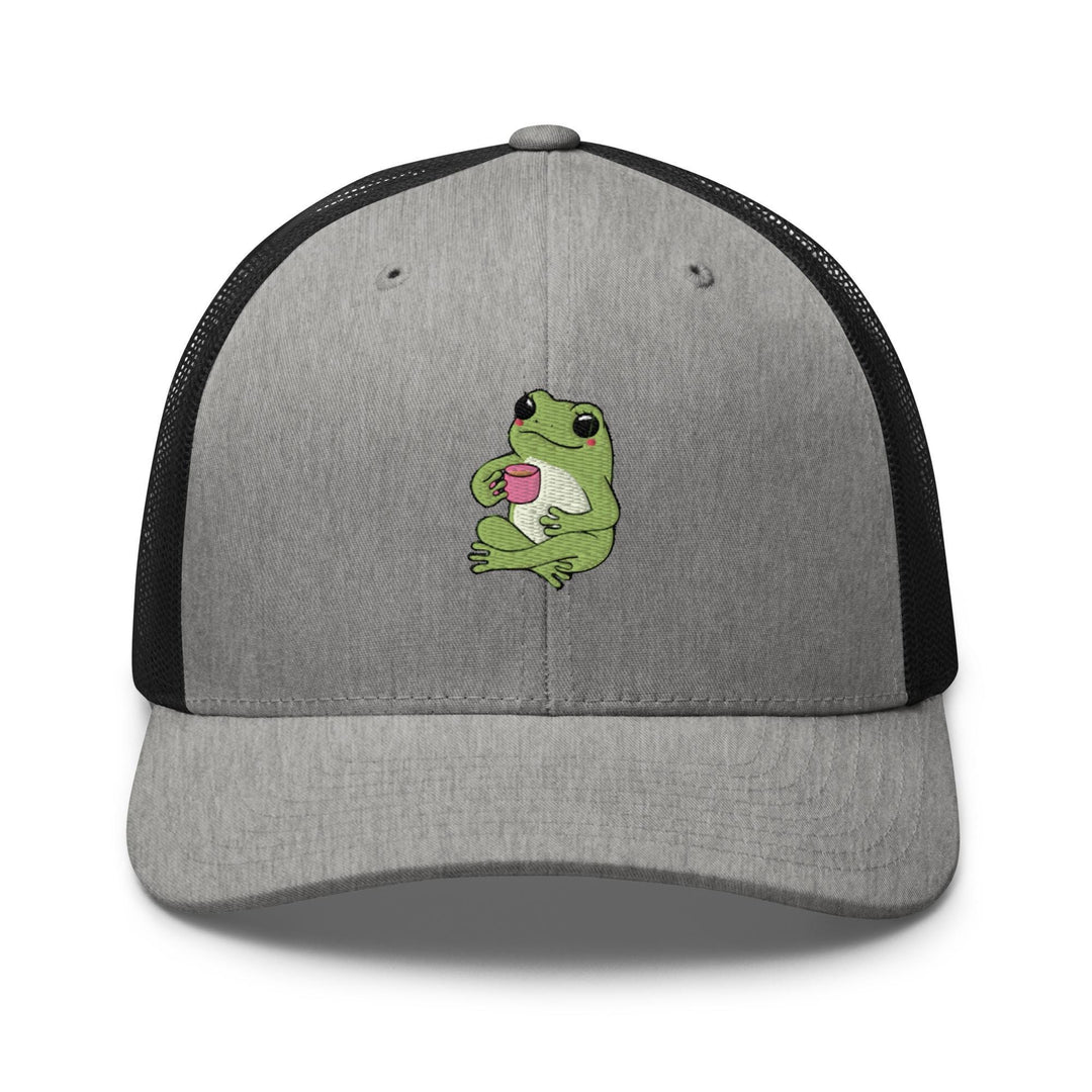 a gray and black trucker hat with a green frog eating a donut