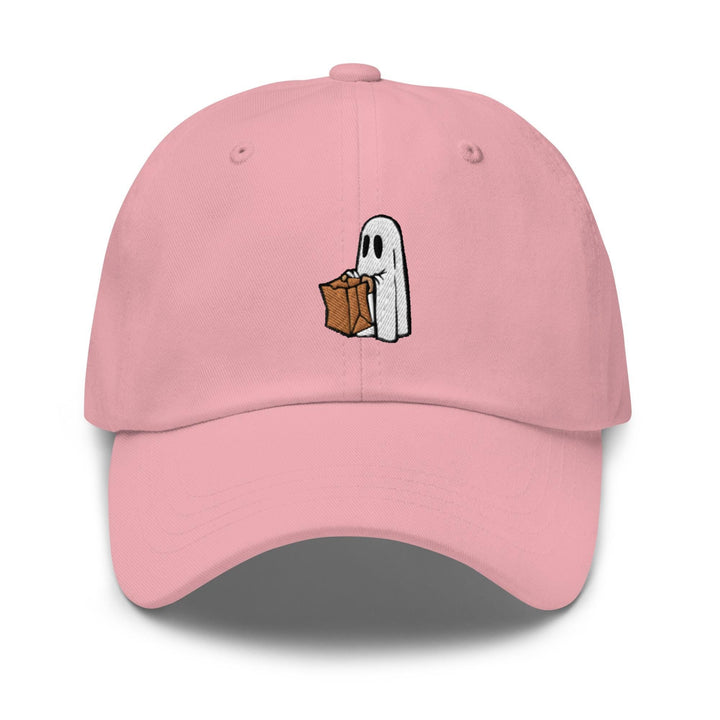 a pink hat with a ghost holding a box