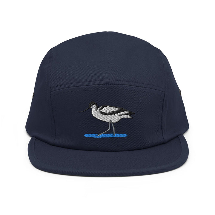 a blue hat with a bird embroidered on it
