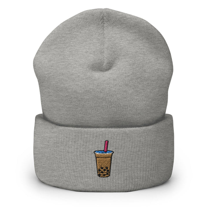 a gray beanie with a drink in it