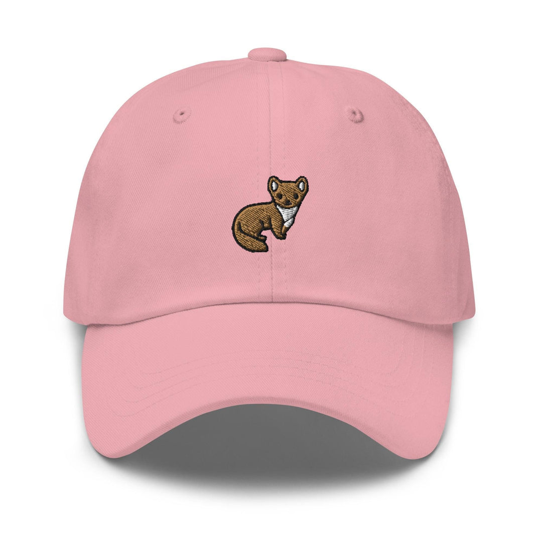 a pink baseball cap with a brown bear embroidered on the front
