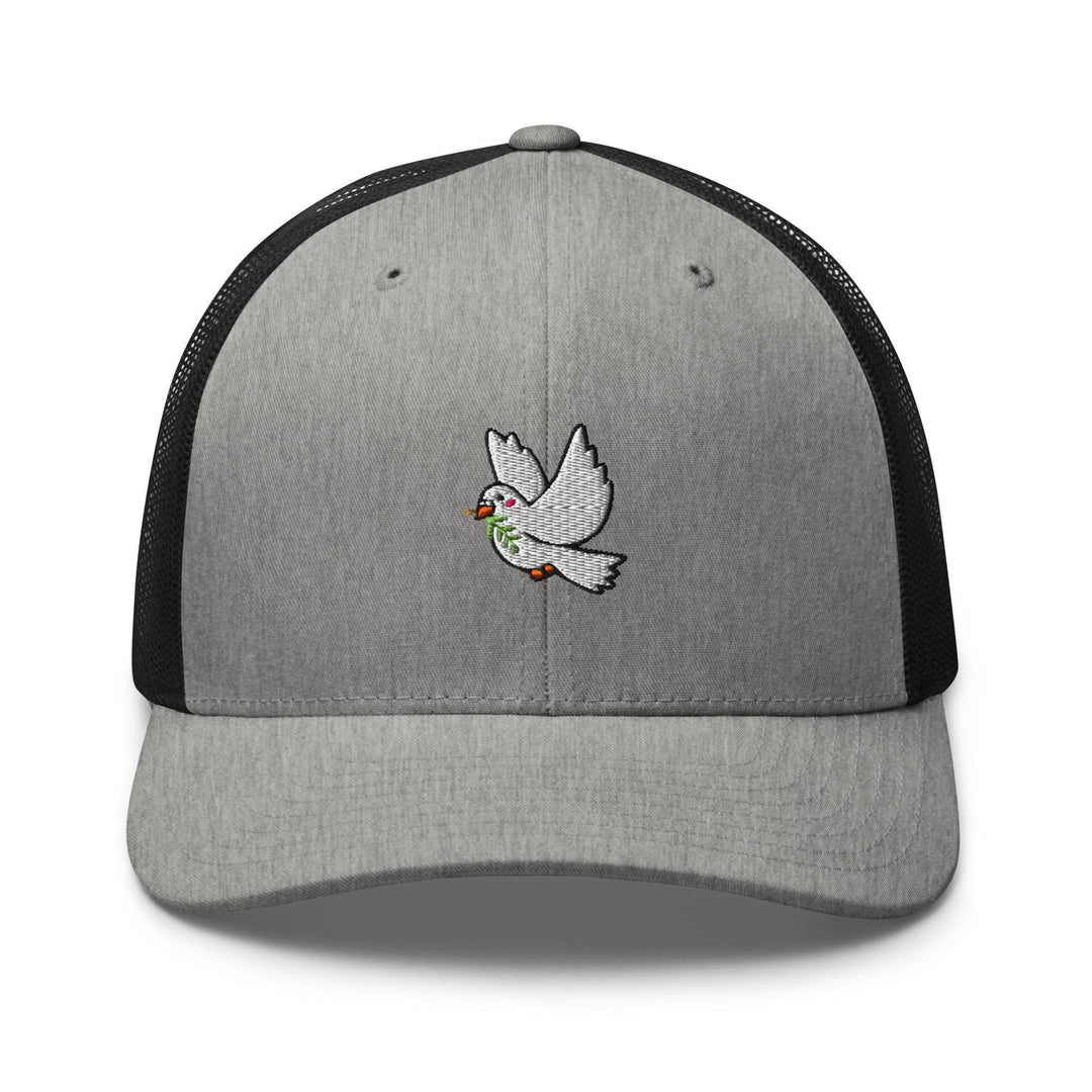 a gray and black trucker hat with a bird embroidered on the front