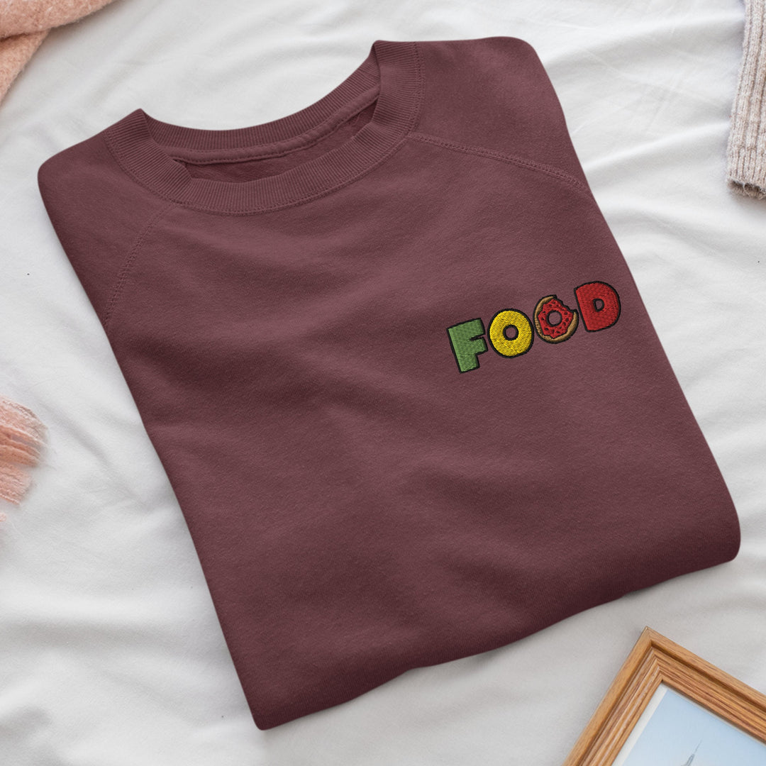 a t - shirt with the word food on it