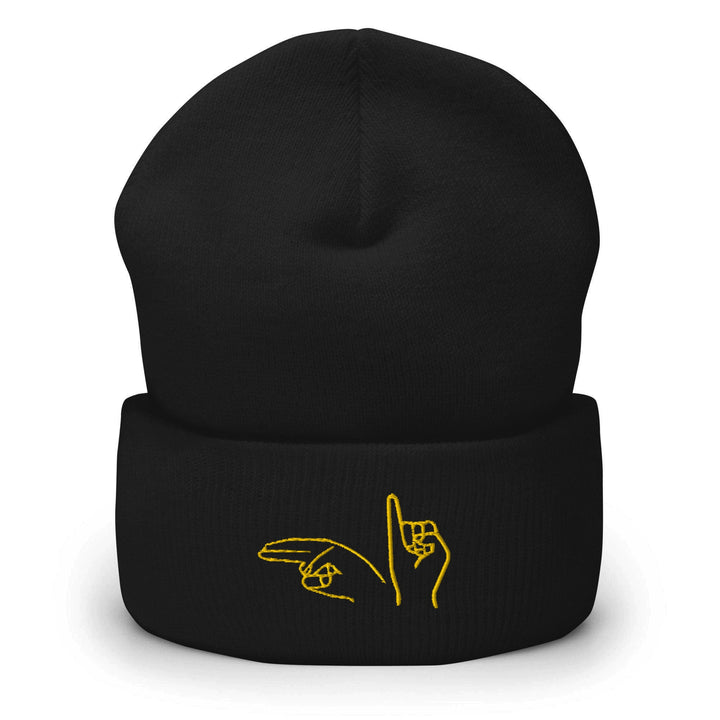 a black beanie with a yellow hand holding a pencil