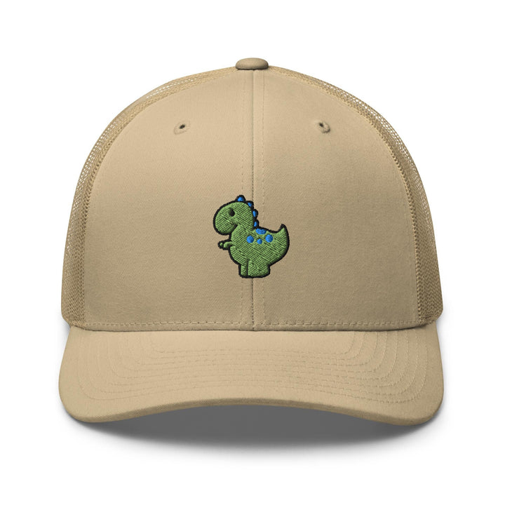 a tan trucker hat with a green dinosaur embroidered on the front