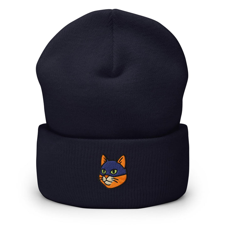 a blue beanie with a cartoon cat on it
