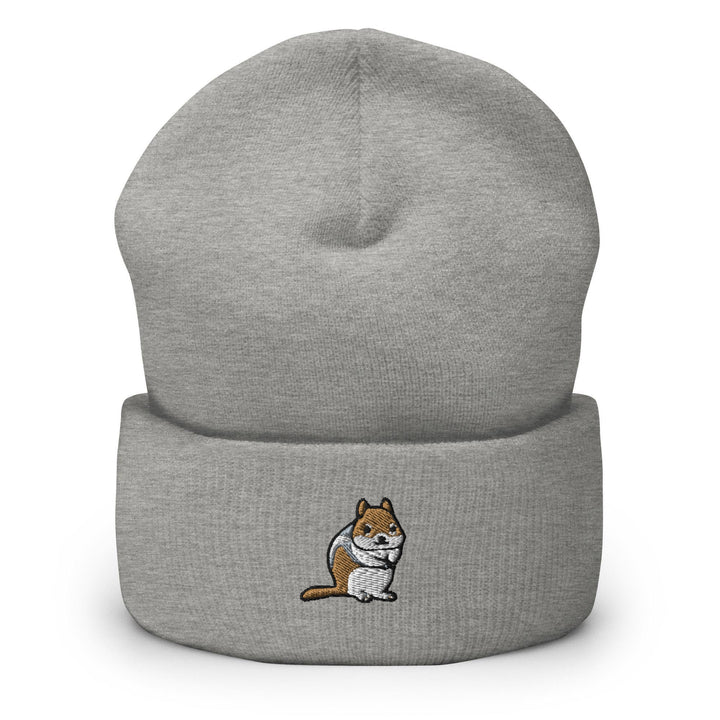a grey beanie with a cartoon cat on it