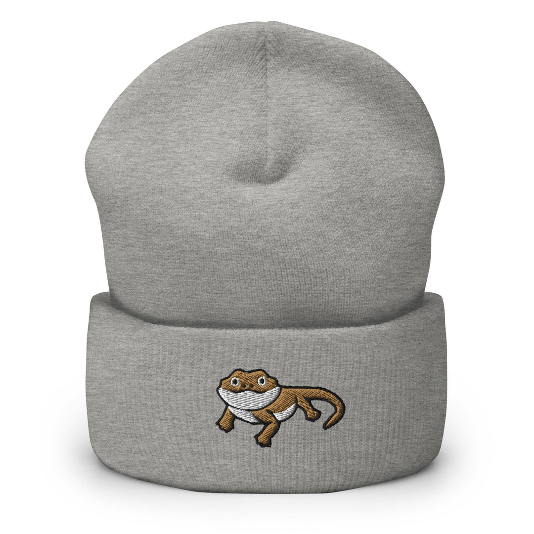 a gray beanie with a cartoon cat on it